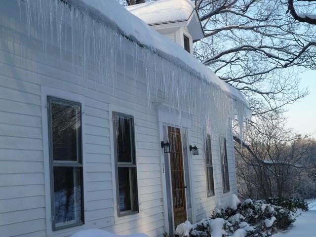 Before; Note the ice dam creating icicles