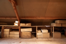 attic of house with boxes in storage