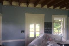 Spray foam rim joist, with injection foam in existing walls.